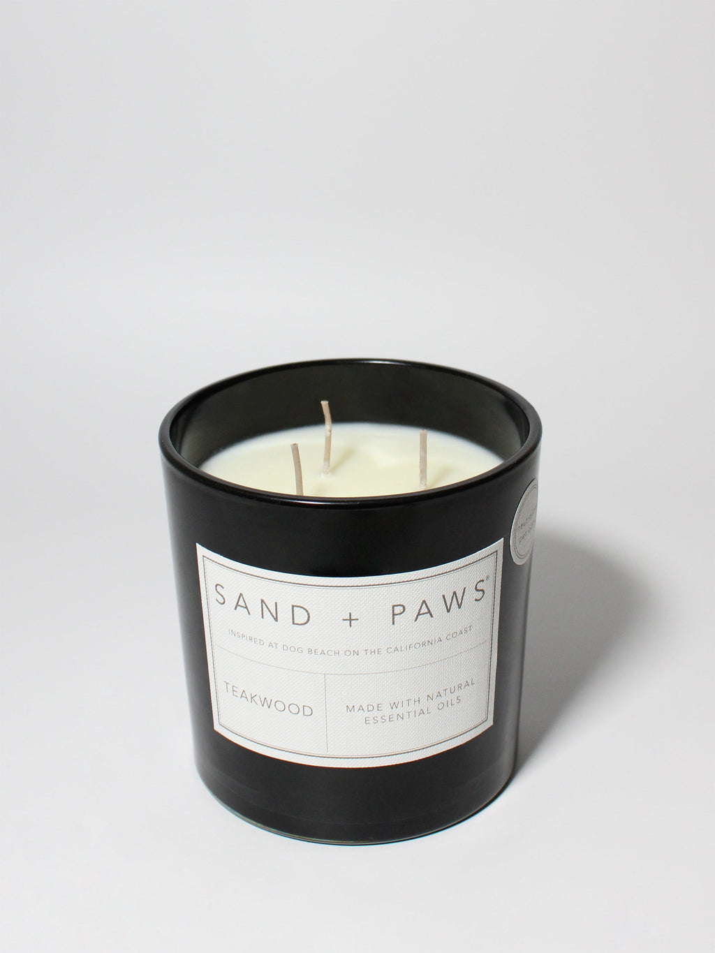 Sand + Paws Teakwood 21 oz cozy scented candle
