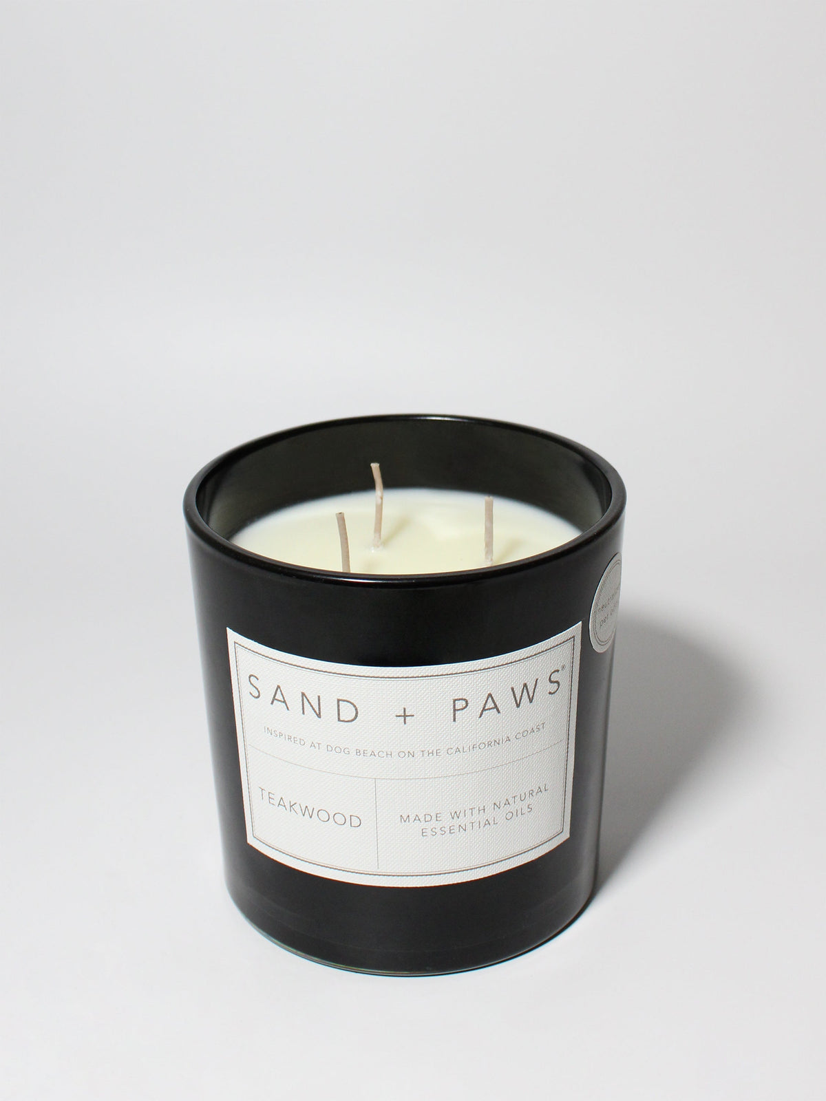 Sand + Paws Teakwood 21 oz cozy scented candle