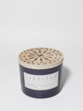 Saddle & Cardamom 12 oz warm scented candle