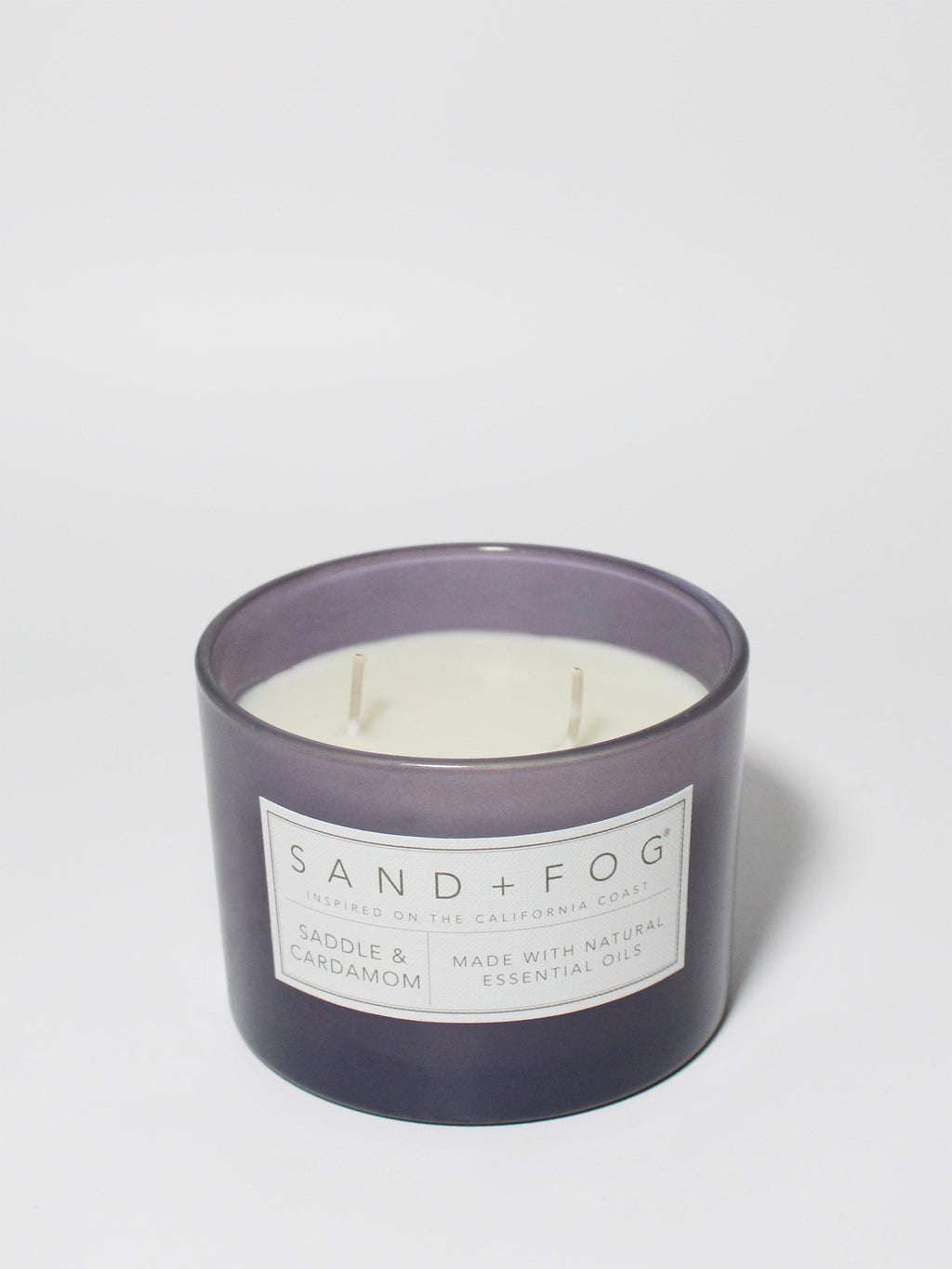 Saddle & Cardamom 12 oz warm scented candle